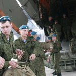Why does Serbia demand the construction of a Russian military camp in Balkans?
