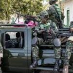 A coup attempt in Gambia as a mirror of battle for power